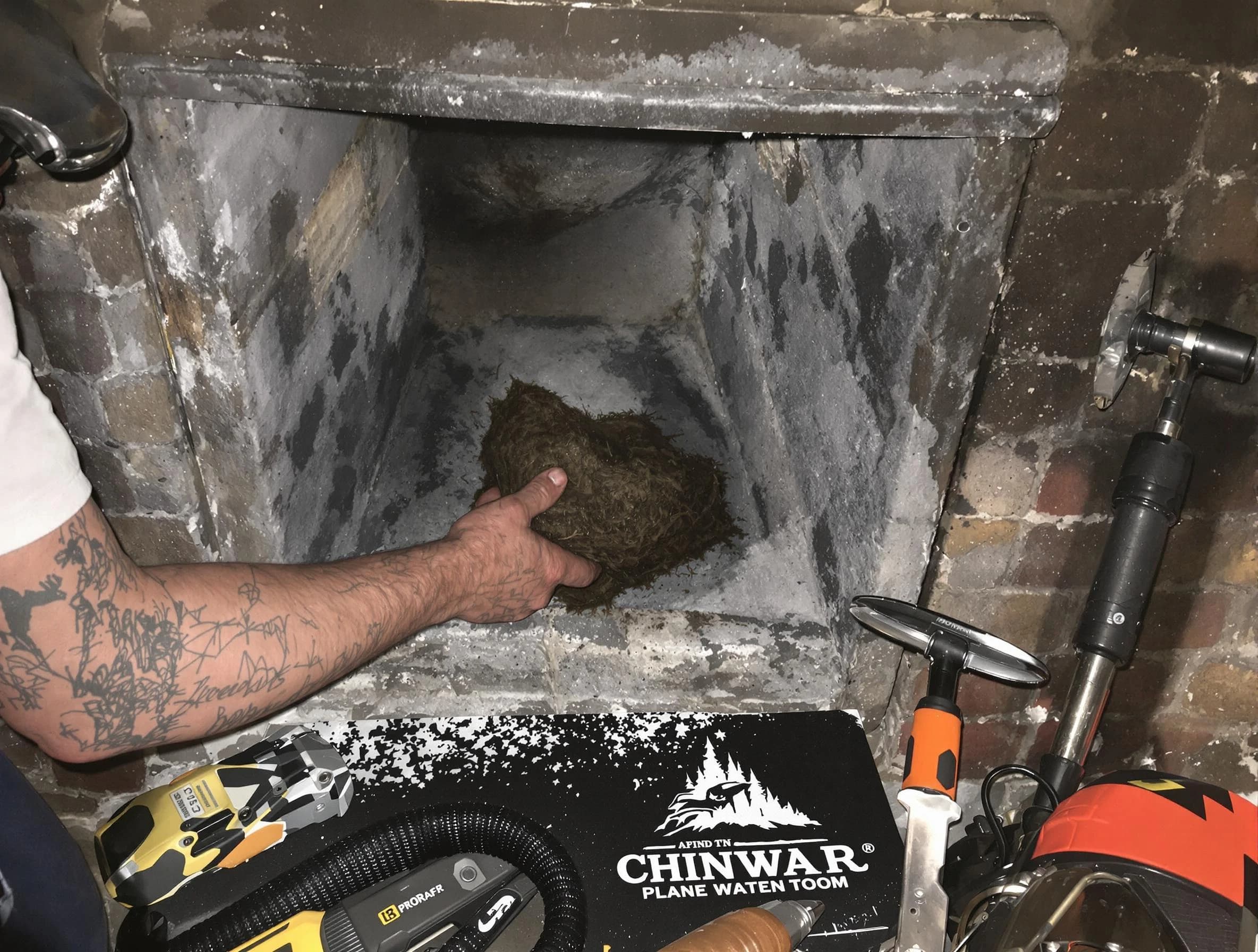 Cherry Creek Chimney Sweep safely removing debris and screening chimney in Cherry Creek, CO